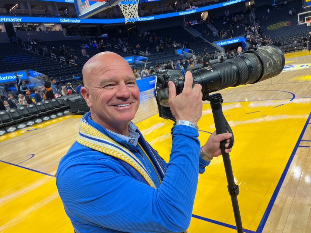 Chris Conner Photography taking professional photos at a basketball game
