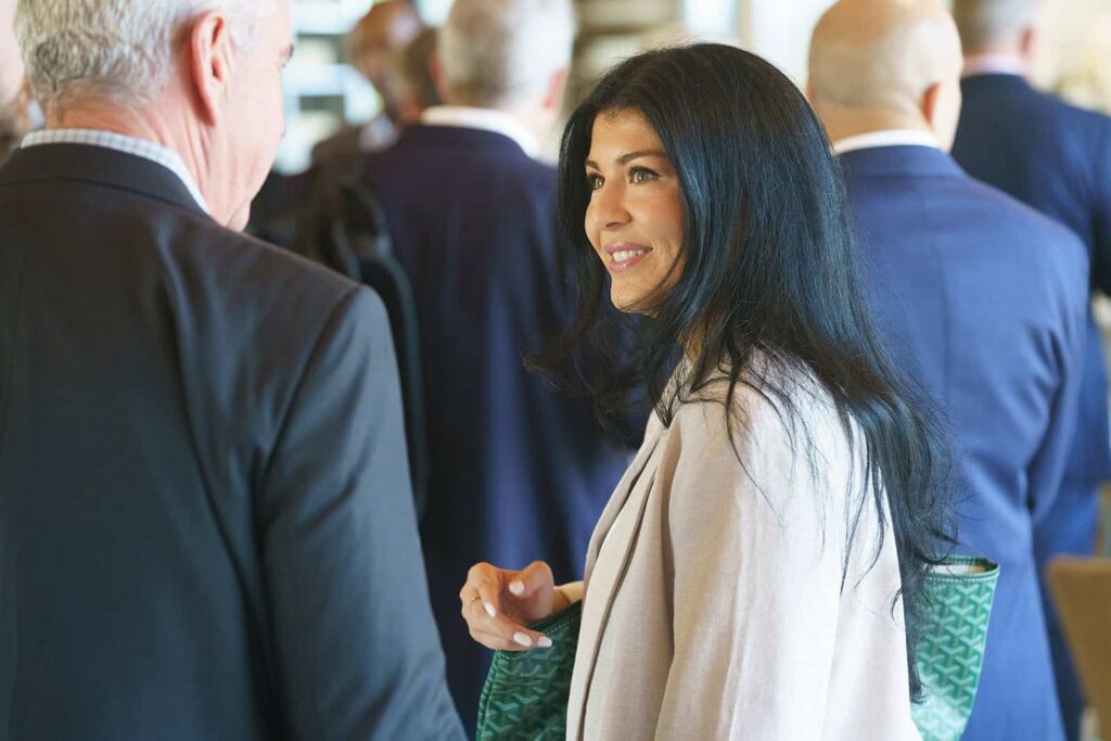 Female executive socializing at a non-profit fundraising event in San Francisco
