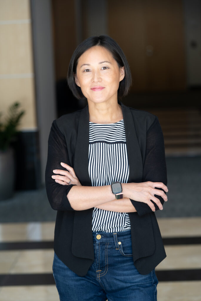 Executive headshot of woman smiling