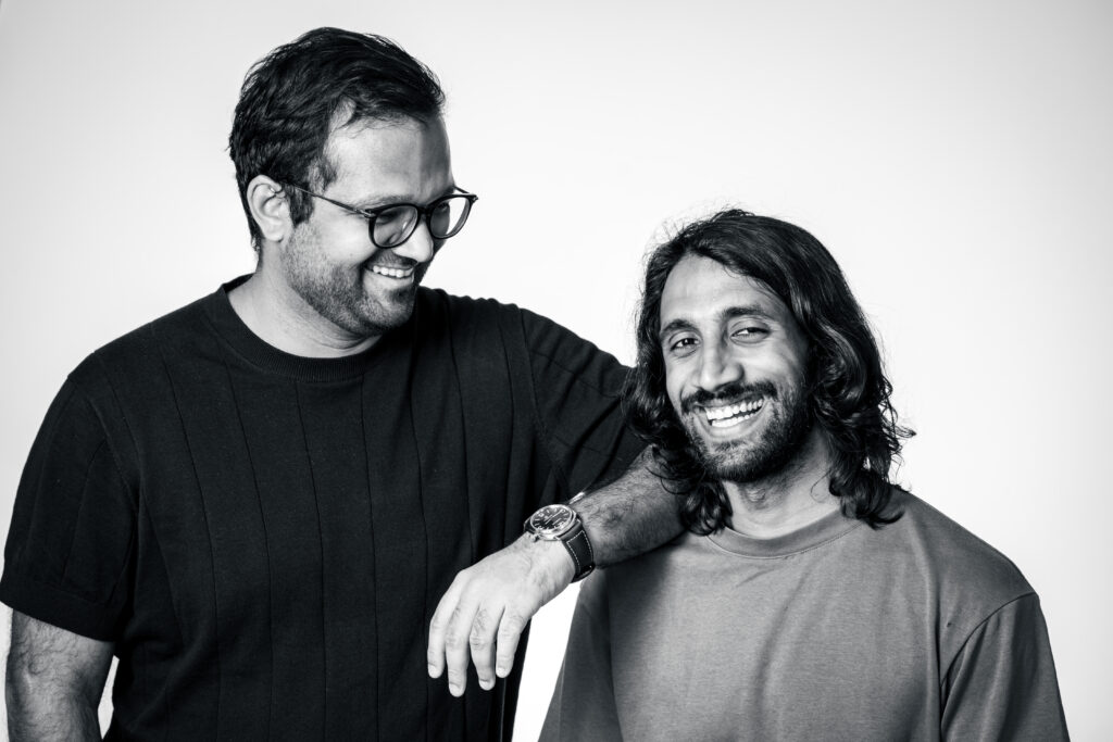 Executive Headshot of two corporate team members