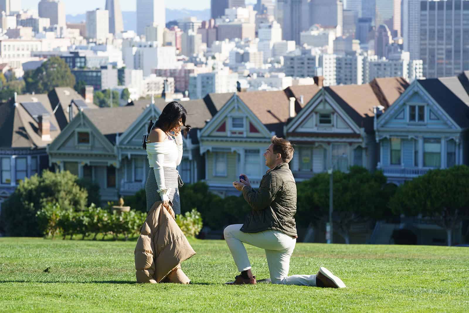 Surprise proposal at Alamo Square Park with San Francisco’s Painted Ladies in the background